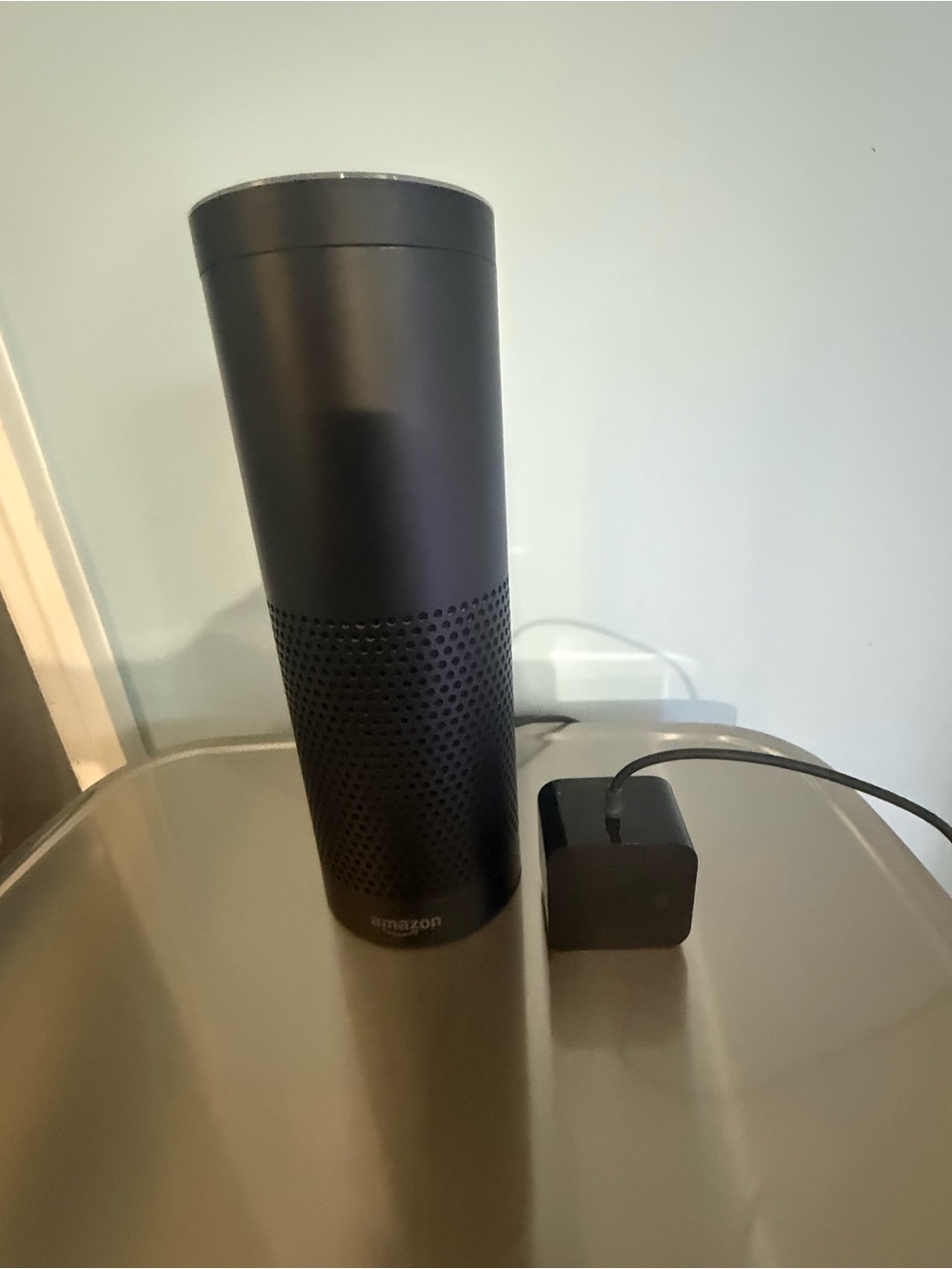 Amazon Black Cylindrical Smart Speaker with Power Adapter